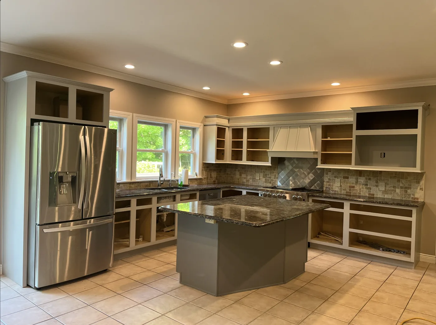 Sage green kitchen cabinet painting Scranton PA - Heritage Kitchens